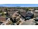 Aerial view of house and neighborhood, mountain backdrop at 18651 E Superstition Dr, Queen Creek, AZ 85142