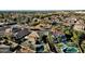 Aerial view of house and neighborhood, pool visible at 18651 E Superstition Dr, Queen Creek, AZ 85142