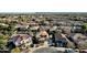 Aerial view of house and neighborhood in suburban area at 18651 E Superstition Dr, Queen Creek, AZ 85142