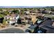 Aerial view of two story house with pool, basketball court and landscaped yard at 18651 E Superstition Dr, Queen Creek, AZ 85142