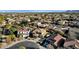 Aerial view of house with pool and surrounding homes at 18651 E Superstition Dr, Queen Creek, AZ 85142