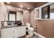 Bathroom features granite vanity, brown bowl sink, and a toilet at 19127 E Wiki Way, Rio Verde, AZ 85263