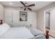 Bedroom with built-in storage and ceiling fan at 19127 E Wiki Way, Rio Verde, AZ 85263