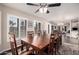 Bright dining room with hardwood floors and view to living room at 19127 E Wiki Way, Rio Verde, AZ 85263