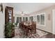 Formal dining room with hardwood floors and large windows at 19127 E Wiki Way, Rio Verde, AZ 85263