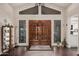 Elegant entryway with ornate doors and hardwood floors at 19127 E Wiki Way, Rio Verde, AZ 85263