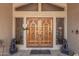 Ornate double front doors with sidelights and lion statues at 19127 E Wiki Way, Rio Verde, AZ 85263