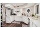 Modern kitchen with white cabinets and stainless steel appliances at 19127 E Wiki Way, Rio Verde, AZ 85263