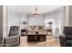 Bright living room features comfy seating and a large window at 19127 E Wiki Way, Rio Verde, AZ 85263