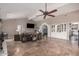 Spacious living area with built-in cabinetry and tile floors at 19127 E Wiki Way, Rio Verde, AZ 85263