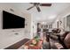 Living room with hardwood floors and view to dining area at 19127 E Wiki Way, Rio Verde, AZ 85263