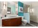 Bright bathroom featuring a modern vanity, vessel sink, and a stylish walk-in shower at 211 E Dawn Dr, Tempe, AZ 85284