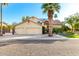 Charming home with well-manicured landscaping and a spacious three-car garage, ideal for Gathering living at 211 E Dawn Dr, Tempe, AZ 85284