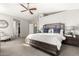 Beautiful main bedroom with a vaulted ceiling, carpeted floors, and neutral color palette at 211 E Dawn Dr, Tempe, AZ 85284