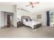 Sunlit main bedroom with a vaulted ceiling, carpeted floors, and a comfortable neutral color palette at 211 E Dawn Dr, Tempe, AZ 85284