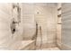 Modern shower featuring light gray tiles, built-in shelves, dual shower heads, and a corner seat at 211 E Dawn Dr, Tempe, AZ 85284