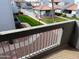 Balcony view showcasing the manicured community landscaping and the walking paths at 220 N 22Nd Pl # 2059, Mesa, AZ 85213