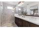 Spa-like bathroom with double vanity, large shower, and modern tile at 23393 N 73Rd Way, Scottsdale, AZ 85255