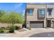 Modern two-story home with attached garage and desert landscaping at 23393 N 73Rd Way, Scottsdale, AZ 85255