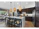 Modern kitchen with stainless steel appliances and white countertops at 23393 N 73Rd Way, Scottsdale, AZ 85255