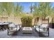 Outdoor patio with fire pit and comfortable seating at 23393 N 73Rd Way, Scottsdale, AZ 85255