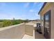 Private rooftop deck with city views and access door at 23393 N 73Rd Way, Scottsdale, AZ 85255