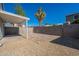 Backyard with a covered patio, brick pavers, and block fencing at 235 N 22Nd Pl # 565, Mesa, AZ 85213