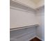 Walk-in closet with ample shelving space and modern design, perfect for storage at 235 N 22Nd Pl # 565, Mesa, AZ 85213