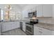 Kitchen with stainless appliances, subway tile backsplash, undermount sink and granite countertops at 235 N 22Nd Pl # 565, Mesa, AZ 85213