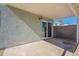 View of the covered patio with access to the home via a sliding glass door at 235 N 22Nd Pl # 565, Mesa, AZ 85213