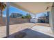 Covered backyard patio with brick pavers and a view of the block fence at 235 N 22Nd Pl # 565, Mesa, AZ 85213