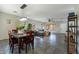 Open floor plan dining room with views to living room and a modern light fixture at 2637 S Sandstone St, Gilbert, AZ 85295