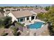 Aerial view showcasing the house and pool area at 28107 N 123Rd Ln, Peoria, AZ 85383