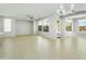 Bright dining room with tile floors and large windows at 28107 N 123Rd Ln, Peoria, AZ 85383