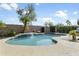 Relaxing kidney-shaped pool with a water feature at 28107 N 123Rd Ln, Peoria, AZ 85383