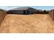 Expansive backyard, ideal for outdoor activities, awaiting landscaping to create your private oasis at 28242 N Nealite Dr, San Tan Valley, AZ 85143