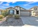 Single-story home with two-car garage and landscaped front yard at 2885 W New River Dr, San Tan Valley, AZ 85144