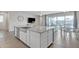 Kitchen island with farmhouse sink, open to dining and living areas at 2885 W New River Dr, San Tan Valley, AZ 85144