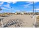 Community sand volleyball court with markings and lights at 2885 W New River Dr, San Tan Valley, AZ 85144