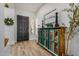 Welcoming entryway with wood-look tile flooring and a decorative cabinet at 3036 E Boston St, Gilbert, AZ 85295