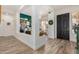 Spacious home entry showcasing tile floors leading to a study and living areas at 3036 E Boston St, Gilbert, AZ 85295