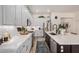 Kitchen featuring bright white countertops and backsplash, as well as light gray cabinetry and stainless steel appliances at 3036 E Boston St, Gilbert, AZ 85295