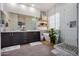 The main bathroom features dual sinks, a stand-alone tub, and a separate glass enclosed shower at 3036 E Boston St, Gilbert, AZ 85295