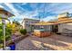 Backyard oasis with hot tub and covered patio at 3125 W Waltann Ln, Phoenix, AZ 85053