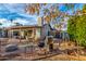 Backyard patio with grill and garden area at 3125 W Waltann Ln, Phoenix, AZ 85053