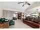 Open living area with high ceilings and a view into the kitchen at 3125 W Waltann Ln, Phoenix, AZ 85053