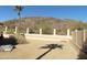 Spacious backyard with mountain views and a gravel area at 3626 E Thunderhill Pl, Phoenix, AZ 85044