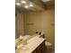 Clean bathroom with a large vanity mirror and double sinks at 3626 E Thunderhill Pl, Phoenix, AZ 85044