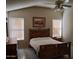 Spacious bedroom with wood furniture and window blinds at 3626 E Thunderhill Pl, Phoenix, AZ 85044