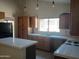 Bright kitchen features ample cabinetry and a breakfast bar at 3626 E Thunderhill Pl, Phoenix, AZ 85044